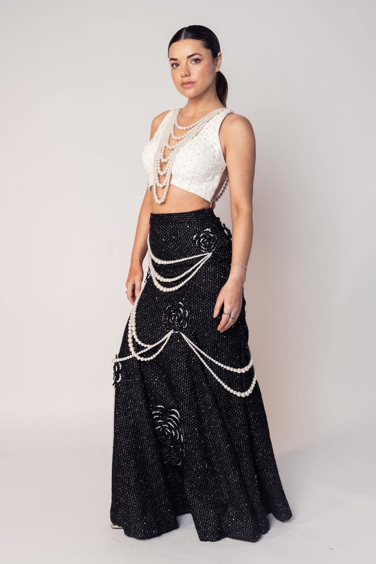 THE COCO TEXTURED PEARL CROP WITH THE BLACK PEARL DRAPE FLOWER SKIRT