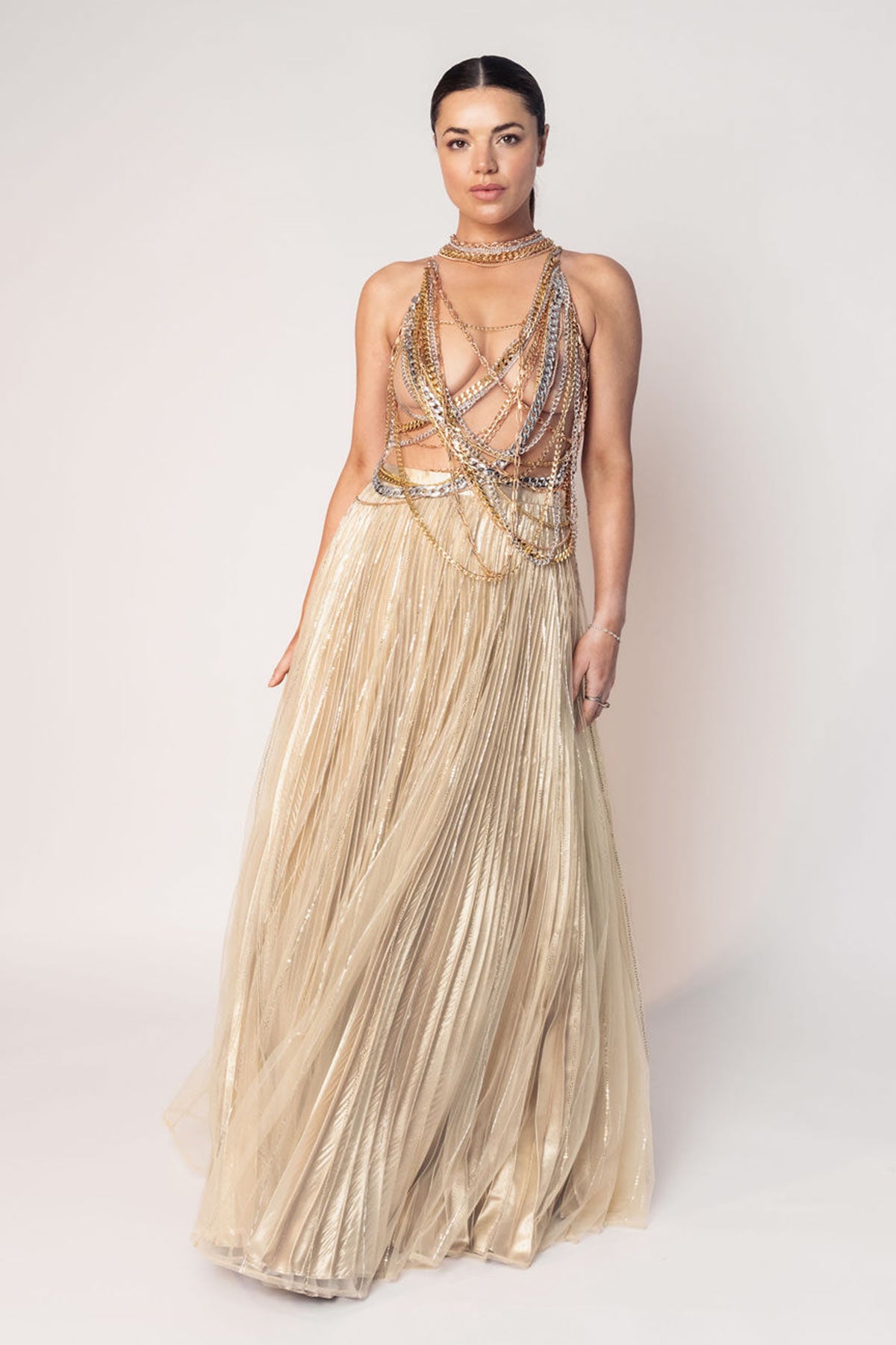 THE DIVA CHAIN BODY SUIT WITH A GOLD LAYERED PLEATED SKIRT