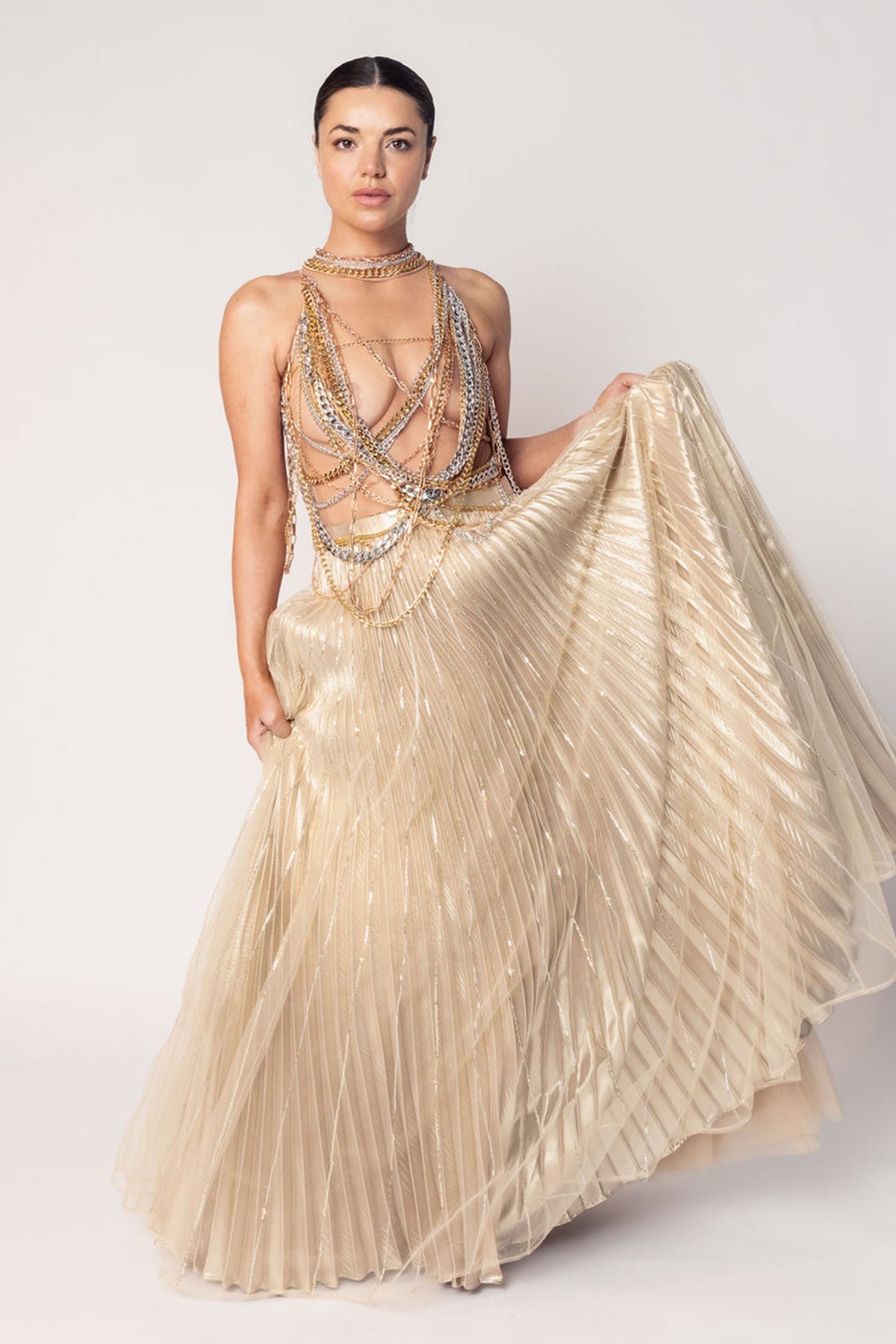 THE DIVA CHAIN BODY SUIT WITH A GOLD LAYERED PLEATED SKIRT