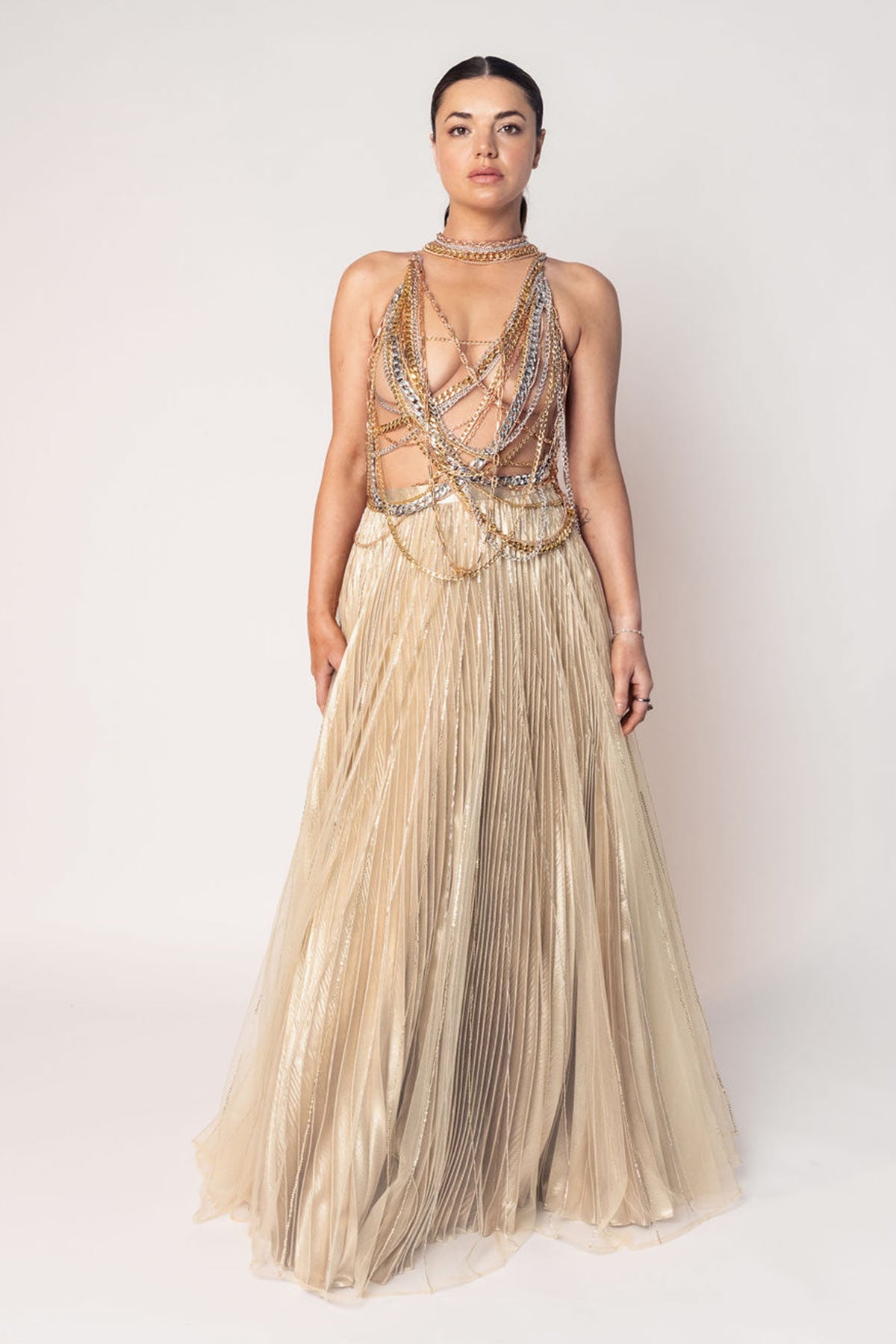 THE DIVA CHAIN BODY SUIT WITH A GOLD LAYERED PLEATED SKIRT