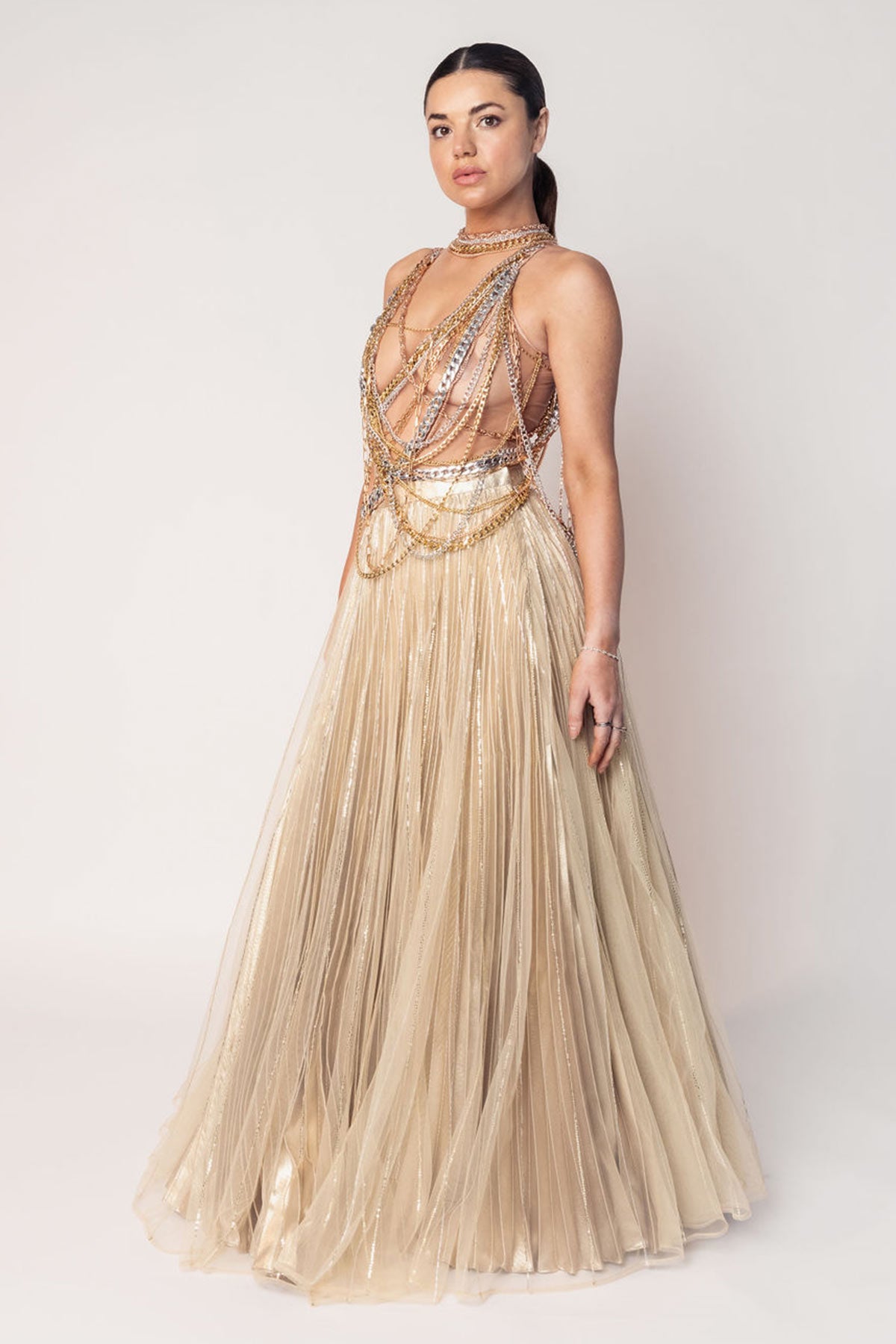 THE DIVA CHAIN BODY SUIT WITH A GOLD LAYERED PLEATED SKIRT