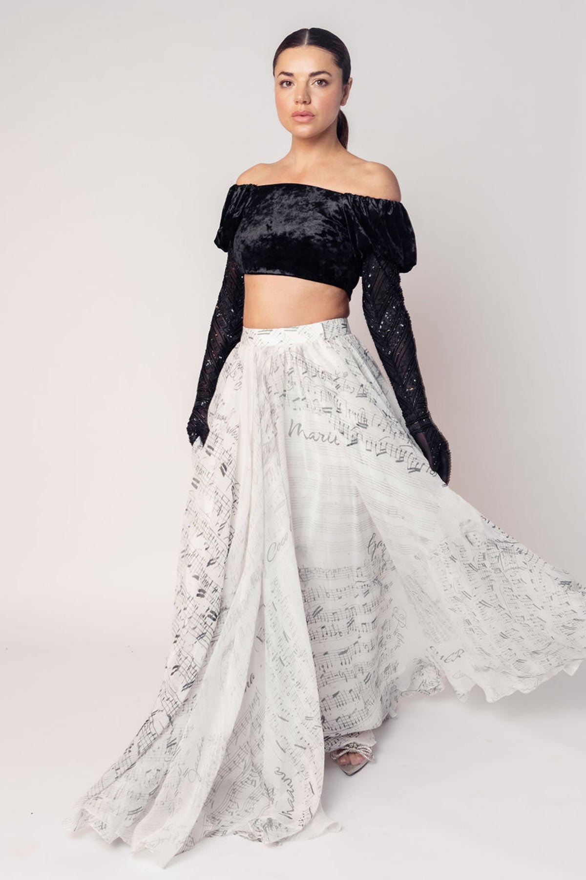 THE GRACE OFF SHOULDER CROP WITH ATTACHED GLOVES AND A PRINTED FLARED SKIRT