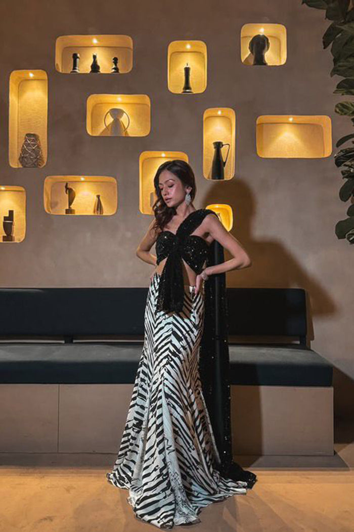 Karishma Rawat In The Hira Sequinned Top With A Striped Skirt